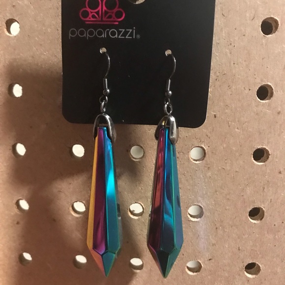 Iridescent “pencil” earrings.
